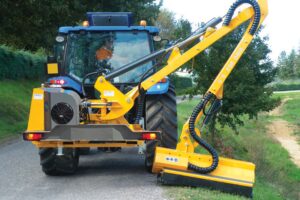 yellow side mounted tractor flail